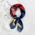 Square silk scarf with burgundy and navy color blocking tied on a white shirt collar - Colorful Stripe Horse Blue Border