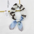 Blue and beige silk scarf with heart chain pattern tied in an elegant knot - Blue Heart Love