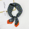 Navy blue paisley silk scarf with orange contrast border and elegant knot styling - Green Paisley