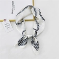 Elegant beige silk square scarf featuring classic black chain and dot pattern textures - White Steel Bead Chain