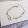 Double-layered 18k gold butterfly clover chain bracelet with lobster clasp detail - Gold Clover