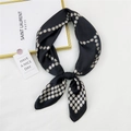 Elegant black silk square scarf featuring white pearl polka dots tied in a stylish bow - Black Steel Bead Chain