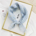 Light blue floral cotton linen small square scarf tied in a stylish decorative bow - Falling Leaves Blue