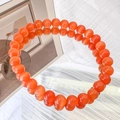 Detailed view of vivid orange cat eye beads bracelet with mirror reflection effect - 6mm / Orange