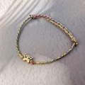 Colorful hand-woven cord bracelet featuring a gold hollow butterfly pendant and adjustable knot - Gold-Butterfly