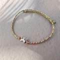 Detailed close-up of handmade woven colorful rope bracelet with silver butterfly charm - Steel Color-Butterfly