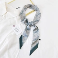 Narrow gray-blue floral silk scarf with green contrast border tied in a knot - 19K Round Seven Leaves / 6*135cm