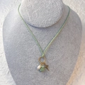 Close-up of woven mint green cord necklace with pearl and irregular stone pendant - Star (Mint Green Cord/Light Green Natural Stone)