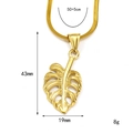 Gold monstera leaf pendant necklace in titanium steel with detailed cutout design - Monstera Leaf Style / Gold