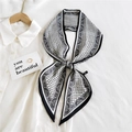 Elegant black and white paisley silk neck scarf tied in a bow with geometric patterns - White Paisley Grid (11)