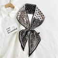 Elegant black and white paisley silk-like scarf tied as a bow on a white shirt - Coffee Polka Dot Paisley (23)