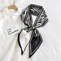 Zebra print long silk scarf for women featuring black and white letters tied on shirt - Black/White Zebra HILLDI (26)