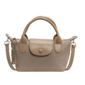 Minimalist beige nylon tote bag with leather trim and matching woven rope pendant - Khaki