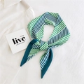 Elegant green and white diagonal striped silk scarf styled as a knotted necktie accessory - Green Interlaced Stripes