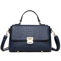 Navy blue handbag with crocodile texture flap, top handle, and golden metal clasp - Blue