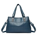 Dark blue quilted leather tote bag with silver hardware and adjustable crossbody strap - Blue