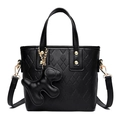 Chic black litchi grain leather bucket bag with V-shaped stitching and puppy charm - Black