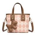 Pink and cream checkered crossbody bag with brown puppy pendant and top handle - Pink