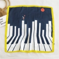 Artistic silk square scarf featuring piano keys and rabbit illustration in navy blue - Red Sun Piano