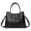 Elegant black embroidered handbag with floral pattern and golden metal hardware - Black