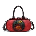 Vintage red cylindrical handbag with handcrafted floral relief and adjustable strap - Red
