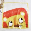 Square silk scarf with cartoon lion pattern and hand-rolled yellow edges on white linen - Big Headed Lion