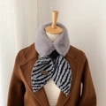 Detail of grey faux fur collar and zebra knit scarf with Hilldi handmade label - Grey Zebra