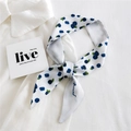 White narrow silk scarf featuring blue blueberry print tied as a bow over a white shirt - Fresh Blueberry Print (15K Blueberry)