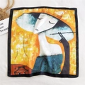 Square silk scarf with black border and abstract artistic portrait print in orange - Female Painter