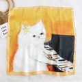 Elegant orange square silk scarf featuring a painted cat playing the piano design - Piano Playing Cat