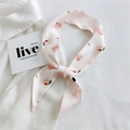 Pink silk skinny scarf with peach and lip prints tied on a white shirt collar - Sweet Pink Peach (22K Peach)