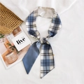 Blue plaid skinny silk scarf tied in a bow with soft aesthetic summer styling - Gradient Plaid Blue