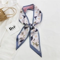 Pink and blue floral skinny twilly scarf tied on a straw bag for summer style - 10L Floral Grey Edge
