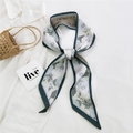 Floral print green and cream skinny silk scarf styled as a bow on a white collared shirt - 11L Floral Green Edge