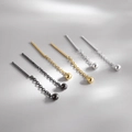 Minimalistische Kugel-Ohrhänger in Schwarz, Gold und Silber auf grauem Hintergrund präsentiert - Silber (A09)