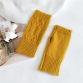 Ginger yellow knitted fingerless gloves with elegant cable patterns on white fabric - 8*18cm / Yellow