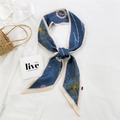 Dark blue skinny silk scarf with astrology sun and star patterns tied on a straw bag - 26L Constellation Navy