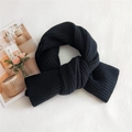Classic black ribbed knit scarf made of thick wool for warmth and winter styling - Black