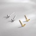 Minimalist silver and gold clover leaf stud earrings shown in natural soft light - Silver Leaf Style (137)