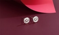 Macro detail of S925 sterling silver button earrings with hallmark and refined texture - Button Style (F7)