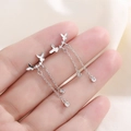 Elegante 925 zilveren vlinder kwastje oorbellen met zirkonia in de hand - Vlinder Kwastje Stijl (A16)