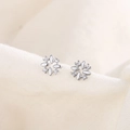 Elegant silver zircon wreath stud earrings featuring marquise shapes on a knit background - Silver