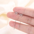 Elegant S925 sterling silver bow tassel threader earrings shown on hand for scale - Bowknot Tassel Style (A97)