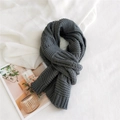 Thick dark grey chunky knit scarf with classic cable stitch pattern for winter warmth - Gray