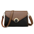 Bolso bandolera bicolor marrón y negro con hebilla redonda de metal dorado elegante - Negro