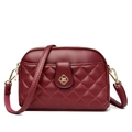 Elegant wine red crossbody bag with quilted lychee leather and gold floral buckle - Burgundy