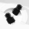 Macro detail of handmade black beaded earrings with dual square geometric drop design - Black