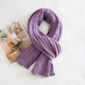 Thick dark purple knit scarf with cable weave texture on a clean white aesthetic background - Purple
