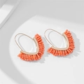 Bohemian orange beaded V-shape fringe earrings with elegant gold-tone metal hooks - Orange