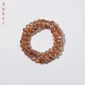Detail van amberkleurige hartvormige glazen kralen voor DIY-sieraden maken - 10mm (ca. 100 stuks) / Amber